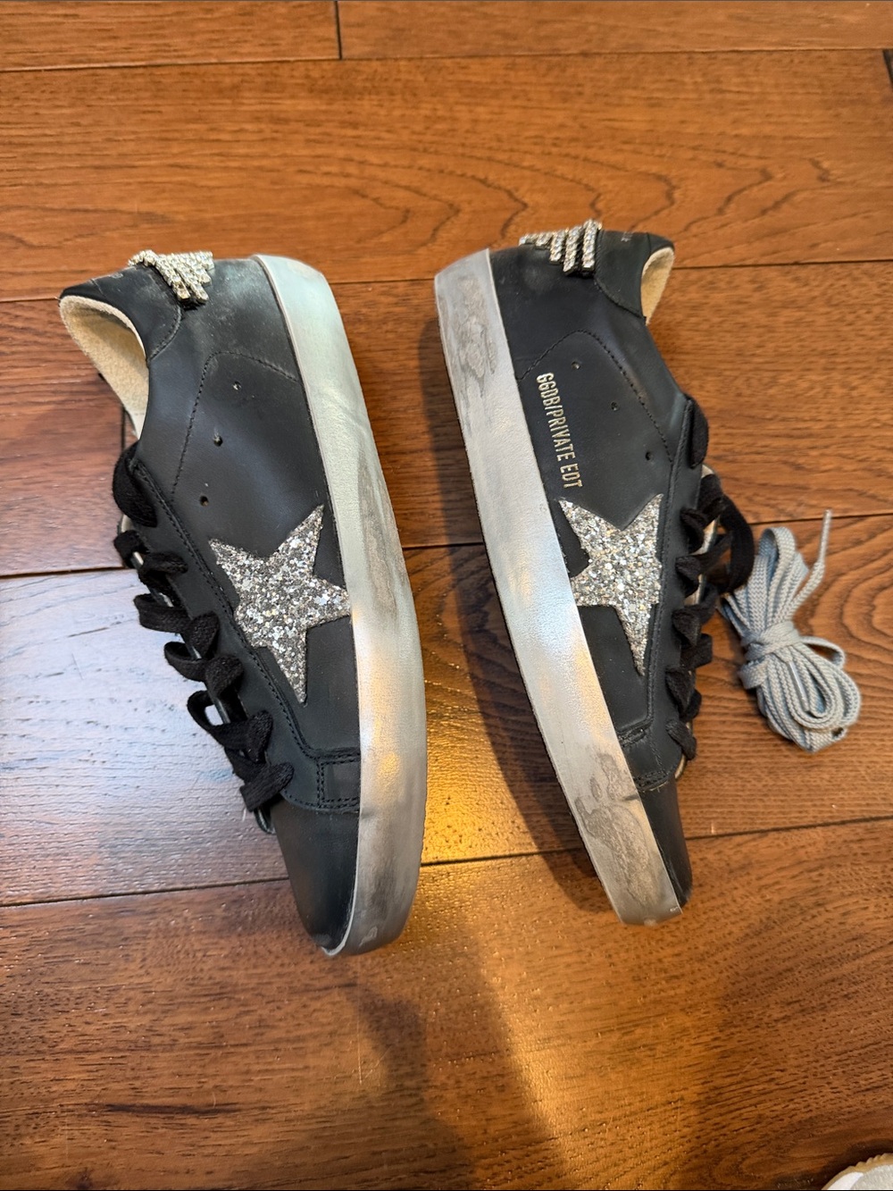 Golden Goose Black Sneakers with Silver Glitter Star